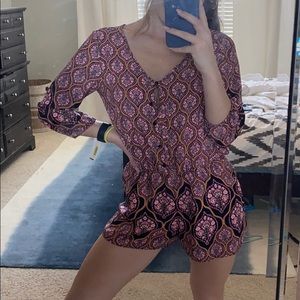 NWT: pink and black patterned romper